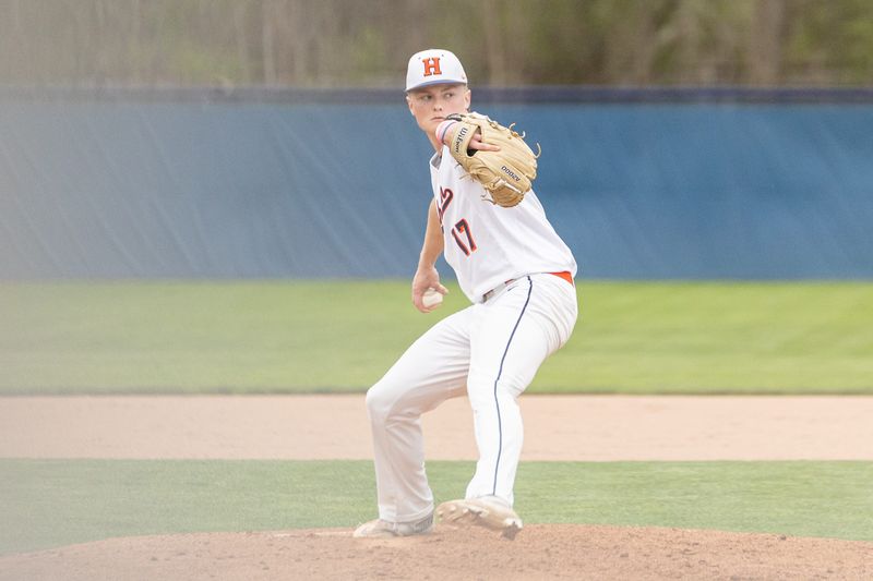 Hope's Owen Weber winds up for the pitch on Friday, April 24 as Hope battles Calvin.