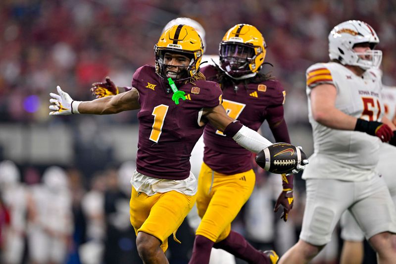 Dec 7, 2024; Arlington, TX, USA; Arizona State Sun Devils defensive back Keith Abney II (1) celebrates after intercepting a Iowa State Cyclones pass during the second half at AT&T Stadium. Mandatory Credit: Jerome Miron-Imagn Images