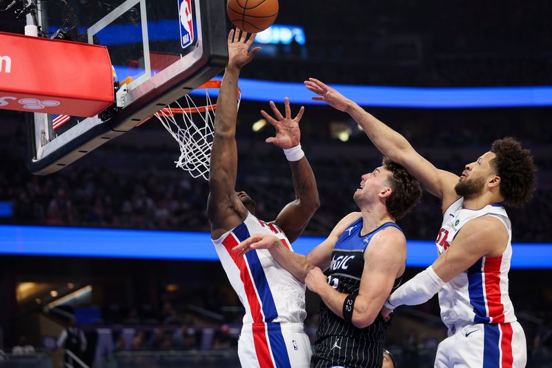 Detroit Pistons center Jalen Duren (0) blocks a shot from Orlando Magic forward Franz Wagner (22) in the fourth quarter during Game 3 of the first round of the 2026 NBA playoffs at Kia Center in Orlando, Florida, on Saturday, April 25, 2026.