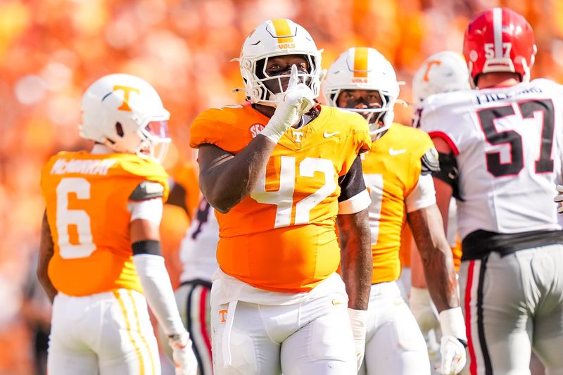 Tennessee defensive lineman Tyre West (42) celebrates after a play during a college football game between Tennessee and Georgia at Neyland Stadium in Knoxville, Tenn., on Sept. 13, 2025.