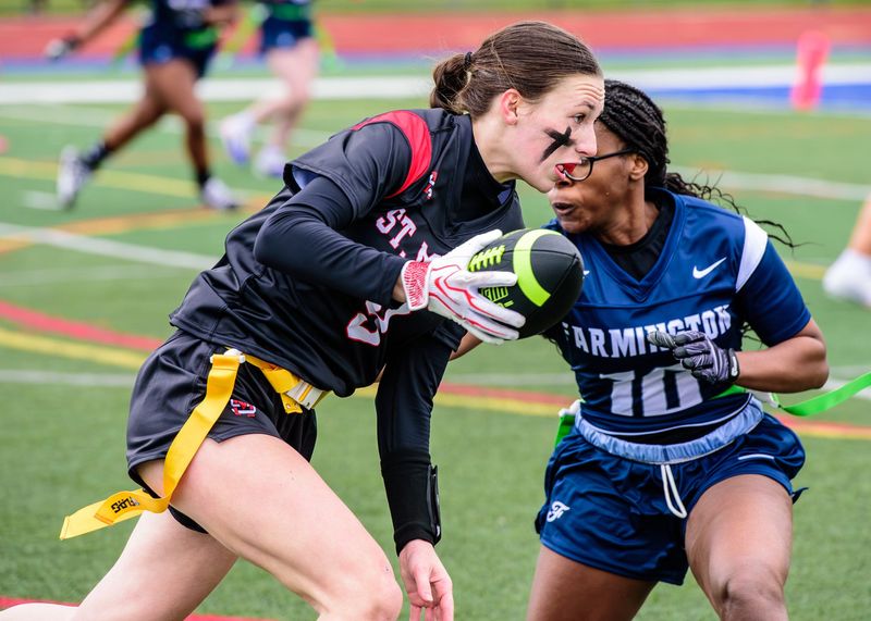 Orchard Lake St. Mary's Olivia Willoughby races for a first down during a Michigan Girls High School Flag Football League football game on Saturday, April 25, 2026.