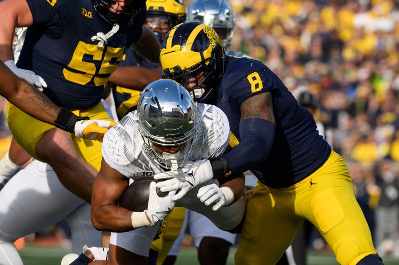 The Lions selected Michigan defensive lineman Derrick Moore (8) in the second round of the 2026 NFL Draft.