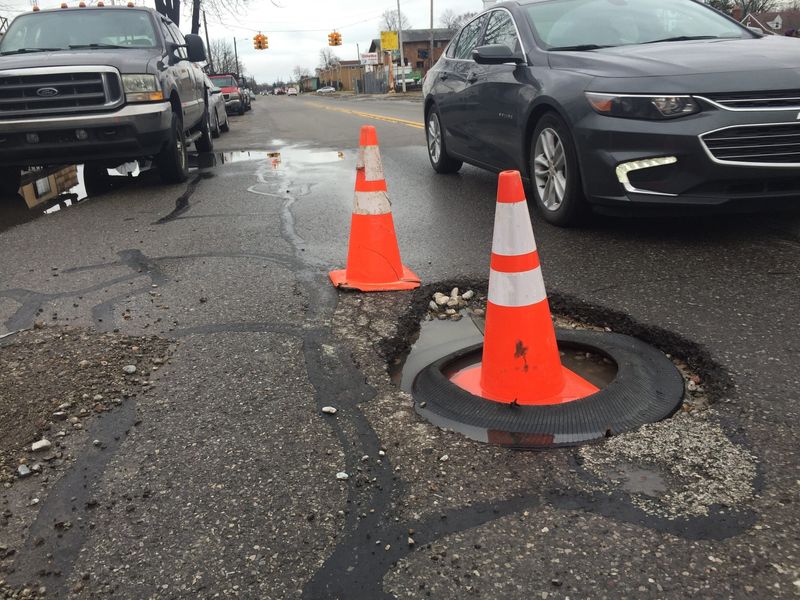 Potholes are scattered along Charest Street in Hamtramck in this file photo from 2015.