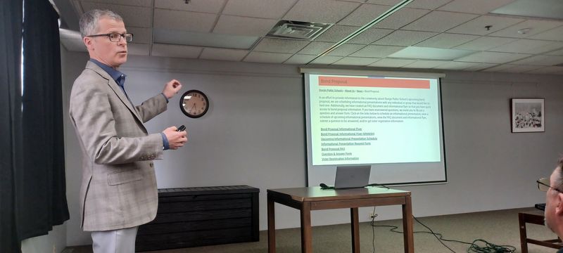 Sturgis Public Schools Superintendent Art Ebert presents school bond proposal information to an audience of approximately 30 Thursday, April 23 at the Sturgis District Library.