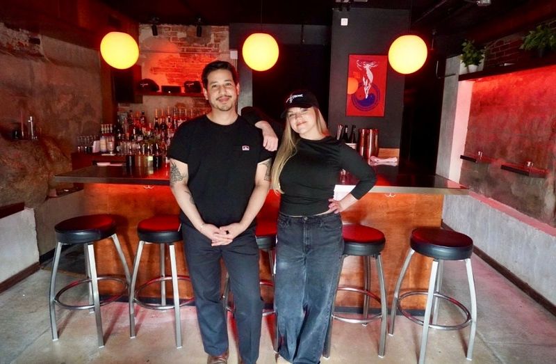 Jonathan Brill and Allison Everitt inside Wet Picnic a small, intimate cocktail bar on the lower-level of a Midtown Detroit Victorian home.