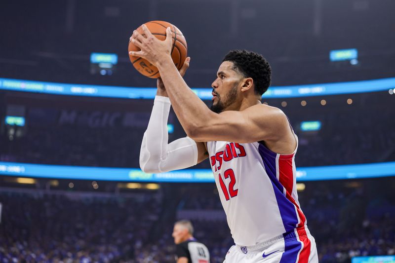 Detroit Pistons forward Tobias Harris (12) shoots during the second quarter against the Orlando Magic during Game 4 of the first round of the 2026 NBA playoffs at Kia Center in Orlando, Florida, on Monday, April 27, 2026.
