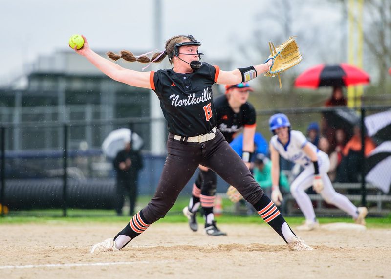 Northville's Mary Gugala pitches during a Kensington Lakes Activities Association-West softball doubleheader on Monday, April 27, 2026.