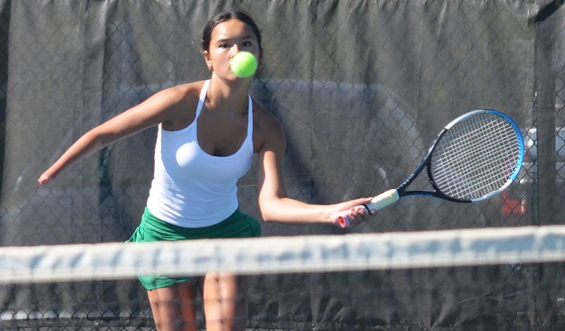 Scenes from the Zeeland West girls tennis match against Holland on Tuesday, April 28, at the Tiger Teusink Tennis Courts.