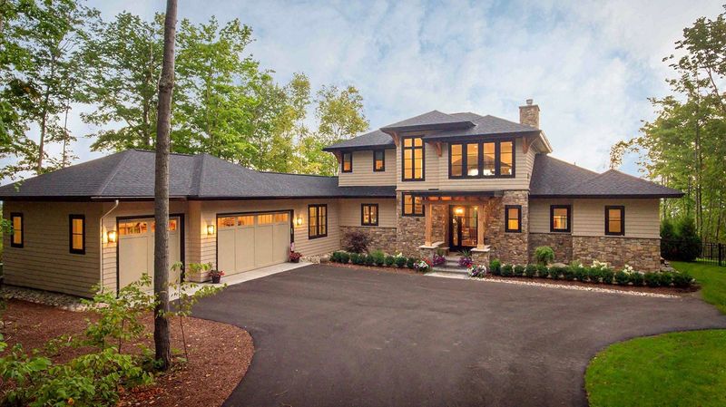 This home at 11649 Summerhill in Charlevoix is 4,316 square-feet and inside a gated community. It features three bedrooms, four baths and is listed for $2,599,000.
