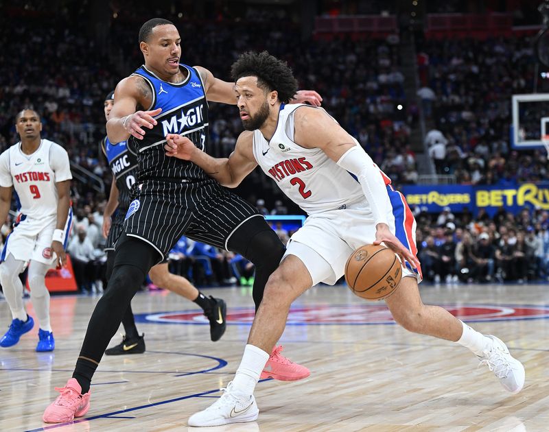Detroit Pistons guard Cade Cunningham (2) drives past Orlando Magic guard Desmond Bane (3) in the first half. Detroit Pistons vs Orlando Magic, Round 1/Game 5 at Little Caesars Arena on Wednesday, April 29, 2026, in Detroit, Mich