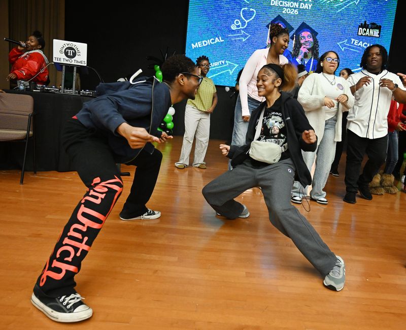 Malachi Anderson, 17, and Courtney Ousley, 17, tear up the dance floor as over 300 college bound high school graduates celebrate their achievement on the annual Detroit Decision Day, hosted by Detroit College Access Network, in Detroit, Michigan on April 30, 2026.