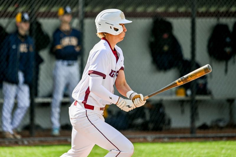 Okemos' Jimmy Pignataro drives in two runs against Grand Ledge during the second inning on Thursday, April 30, 2026, at Okemos High School.