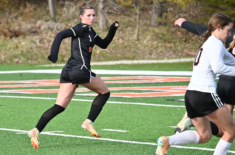 Harbor Springs junior Julia Clarke runs into position Thursday, April 30 as an Elk Rapids player works with the ball. Clarke has been a key defensive piece this season for the Rams.