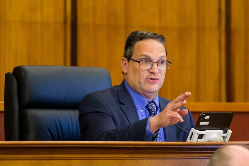 David Woodward, Chair of the Oakland County Board of Commissioners, calls members of the public back to order as they boo him during a meeting of the board on Thursday, April 30, 2026 in Pontiac.