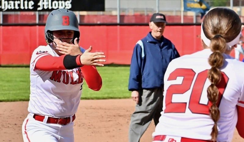 Bedford's Ellen Majewski celebrates her home run during a 15-0 victory over Dundee on Thursday, April 30, 2025.