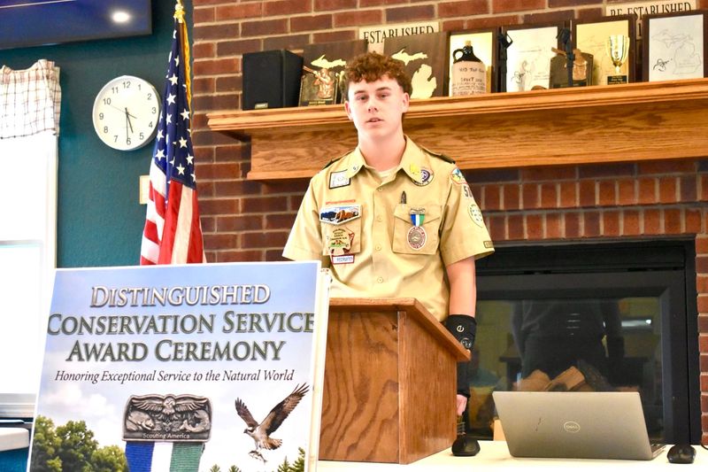 Chase Cousino was presented with the Boy Scouts of America Distinguished Conservation Service Award during a ceremony at the Carleton Sportsmen's Club.