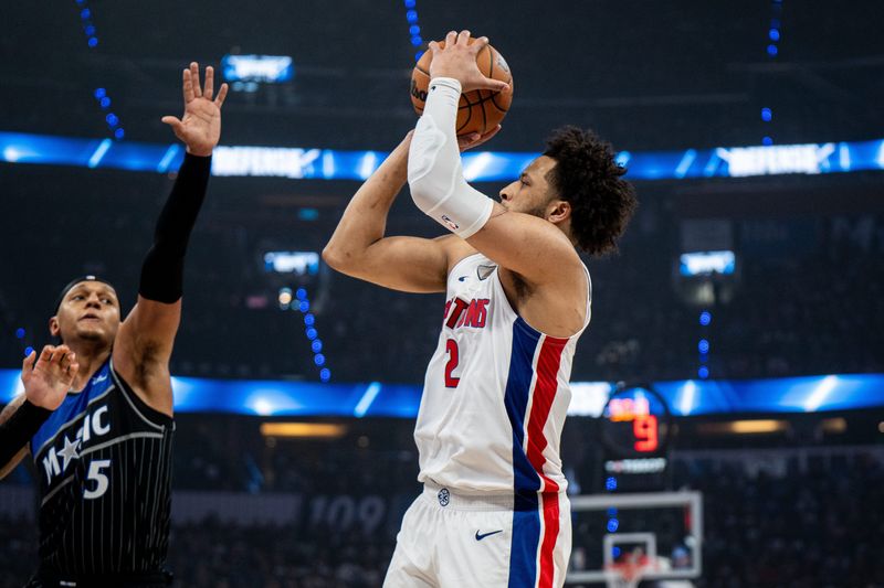 Detroit Pistons guard Cade Cunningham shoots the ball over Orlando Magic forward Paolo Banchero in the second quarter of Game 6 of the first round of the 2026 NBA playoffs at Kia Center in Orlando, Florida, on Friday, May 1, 2026.