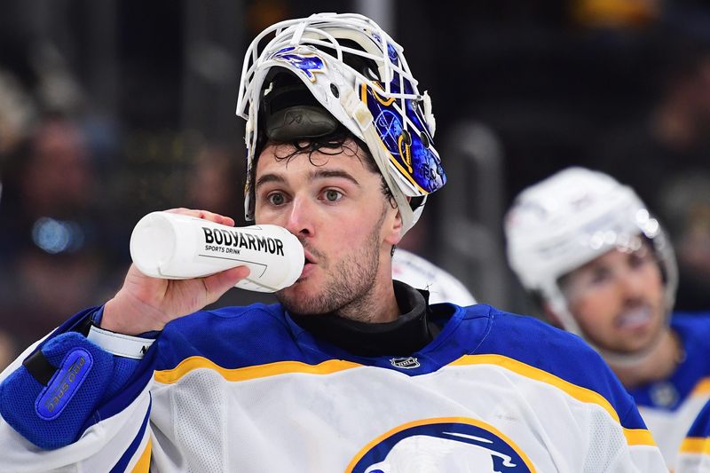 Ex-Red Wings goaltender Alex Lyon (34) takes a sip of water during the playoff series against the Bruins.