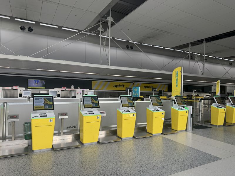 Spirit Airline's check-in counter on Saturday May 2, 2026, just hours after the airline announced it would be ending operations.