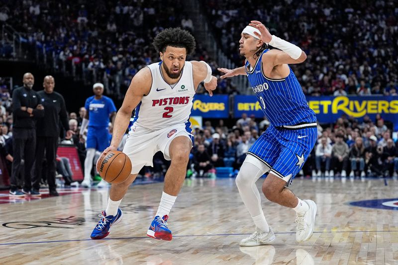 Detroit Pistons guard Cade Cunningham (2) dribbles against Orlando Magic guard Anthony Black (0) during the first half of Game 7 of first round of NBA playoffs at Little Caesars Arena in Detroit on Sunday, May 3, 2026.