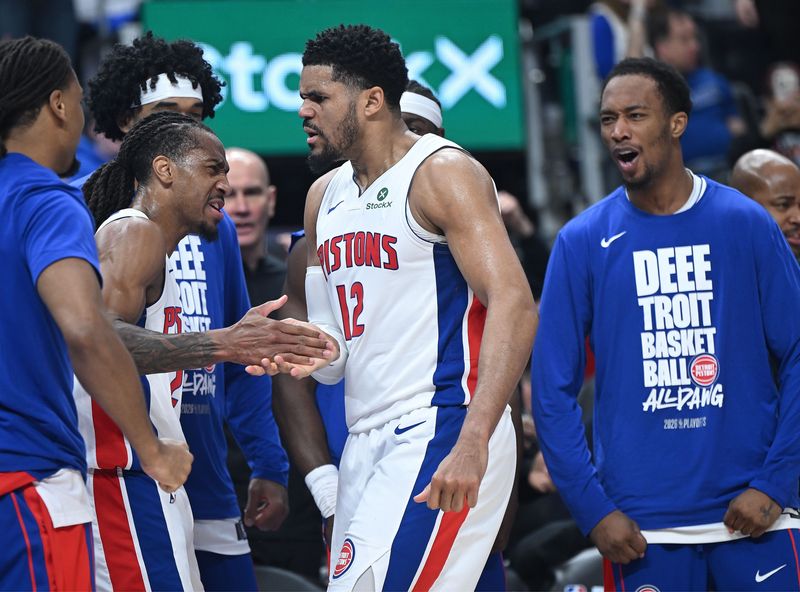 Detroit Pistons forward Tobias Harris (12) celebrates with his teammates in the first half of game seven of their first-round playoff series at Little Caesars Arena on Sunday, May 3, 2026, in Detroit.