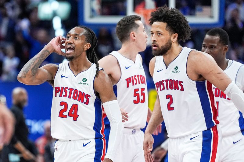 Detroit Pistons guard Daniss Jenkins (24) celebrates a 3-pointer against Orlando Magic with guard Cade Cunningham (2) during the second half of Game 7 of first round of NBA playoffs at Little Caesars Arena in Detroit on Sunday, May 3, 2026.