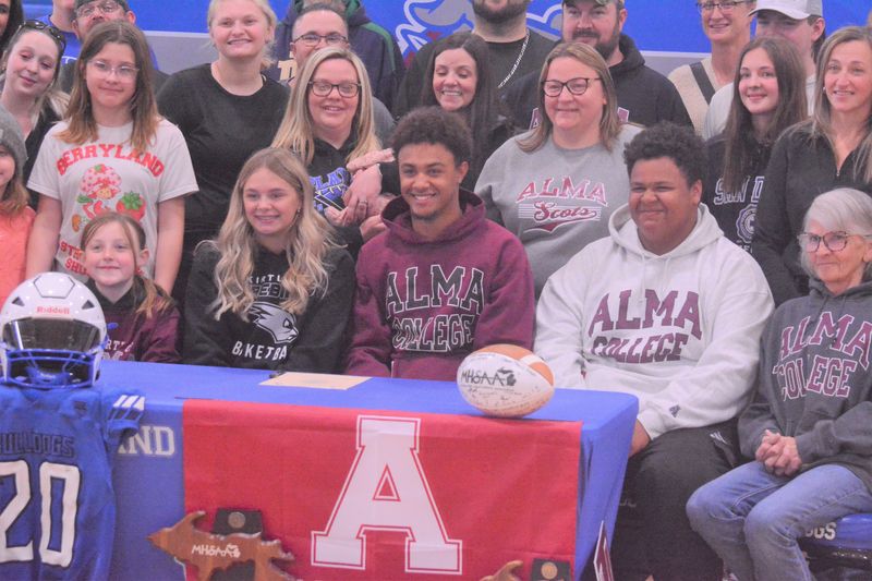 During a two-athlete signing ceremony at Inland Lakes High School on Sunday, May 3, seniors Andre Bradford (Alma College football) and Mary Myshock (Kirtland Community College women’s basketball) made their next destinations known in front of a big crowd of supporters.