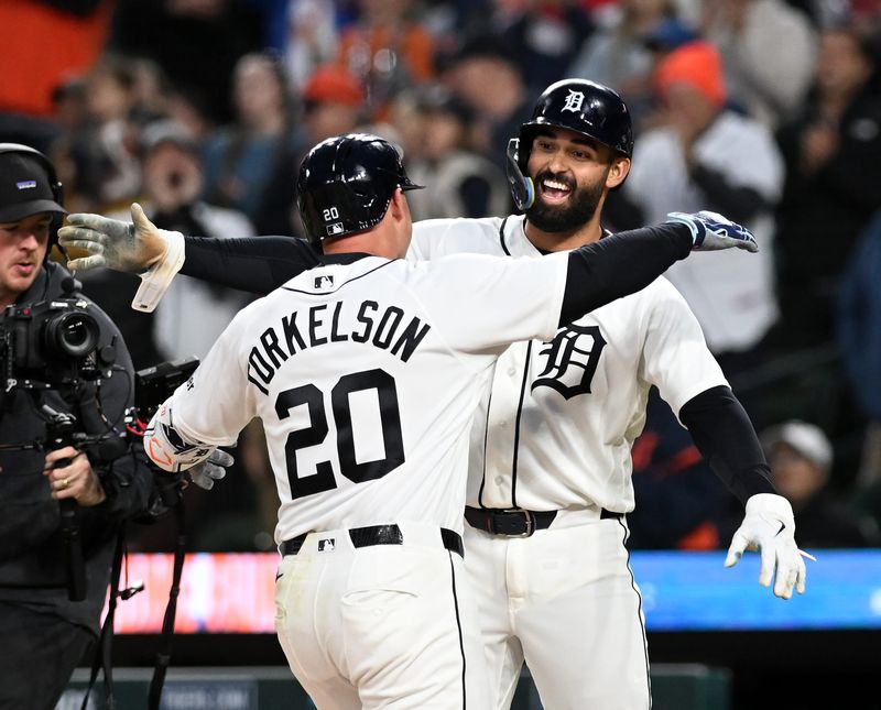 Tigers first baseman Spencer Torkelson (20) reacts with Riley Greene after Torkelson’s two-run home run in the fifth inning.