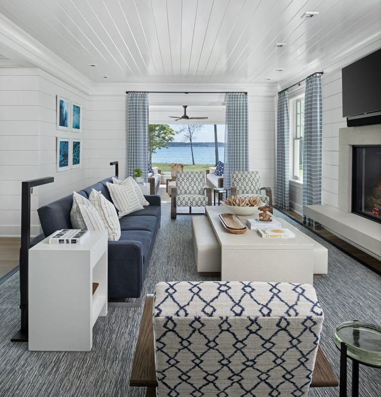 For a second home on Little Traverse Bay, interior designer Amy Miller Weinstein combined the blue hues her client requested with white and classic patterns for a timeless feel.