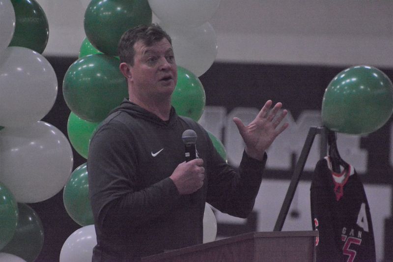 Cheboygan native and current Michigan State University men's hockey coach Adam Nightingale speaks to students at Cheboygan High School on Tuesday, May 5.