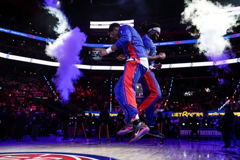 Detroit Pistons centers Jalen Duren, left, and Isaiah Stewart during starting lineup player introductions before Game 1 of the second round of the NBA playoffs against Cleveland Cavaliers at Little Caesars Arena in Detroit on Tuesday, May 5, 2026.
