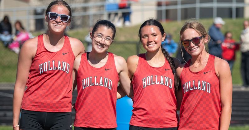 Holland's Tessa Nienhuis, Ashlyn DePoy, Olivia Weiss and Johanna Mulder set the 4x800 school record.