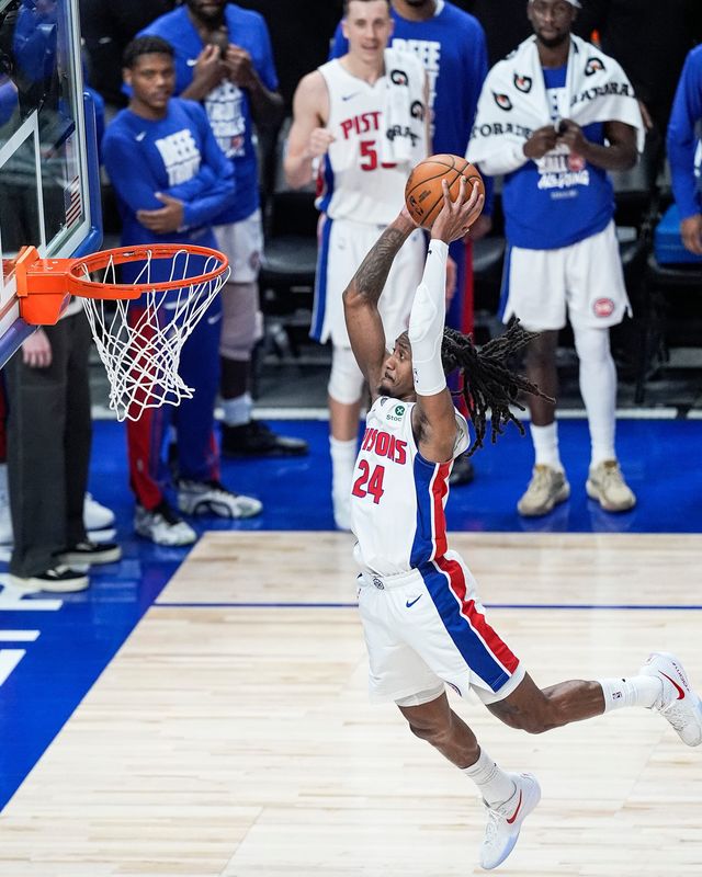 Detroit Pistons guard Daniss Jenkins (24) dunks against Cleveland Cavaliers during the second half of Game 1 of second round of NBA playoffs at Little Caesars Arena in Detroit on Tuesday, May 5, 2026.