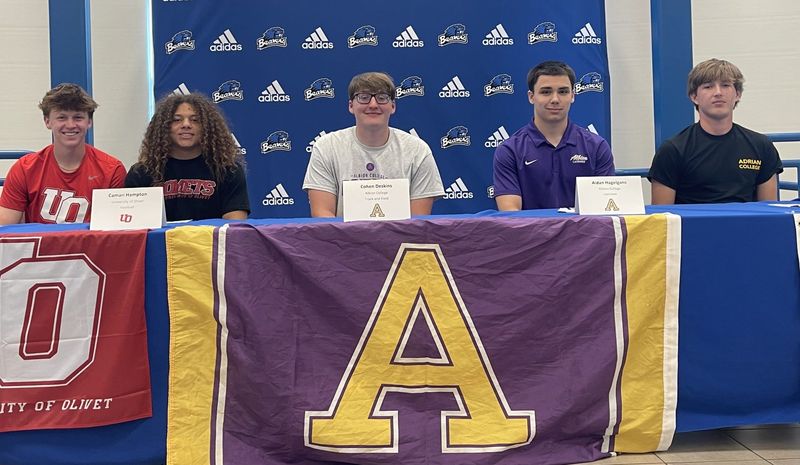Five Harper Creek seniors took advantage of the opportunity to have their family, friends and coaches there to celebrate their decision to compete at the next level at a ceremonial signing event, including Maddox McCarty, Camari Hampton, Cohen Deskins, Aidan Hagelgans and Travis Holmes.