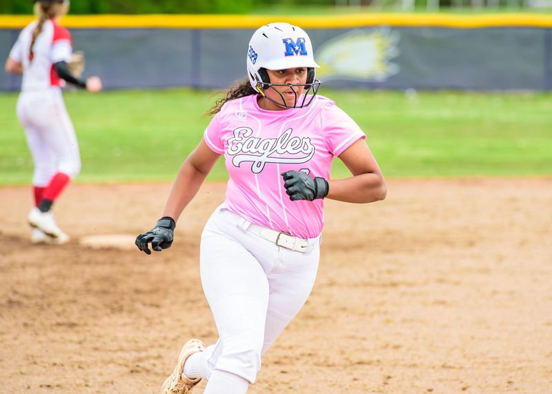 Plymouth Christian Academy's Mariah Wright rounds third base during a Michigan Independent Athletic Conference-Blue softball game on Tuesday, May 6, 2026.