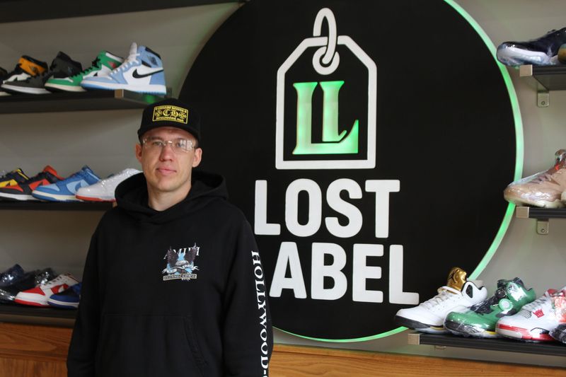 Seth Conklin poses for a photo at Lost Label Resell in Howell on May 1.