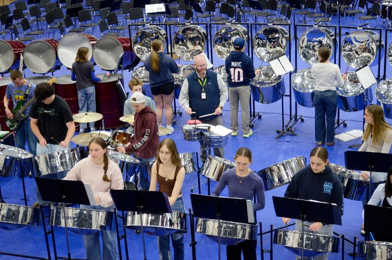 The Petoskey Steel Drum Band and band director Duane Willson work on some music on May 6, 2026 at Petoskey High School.