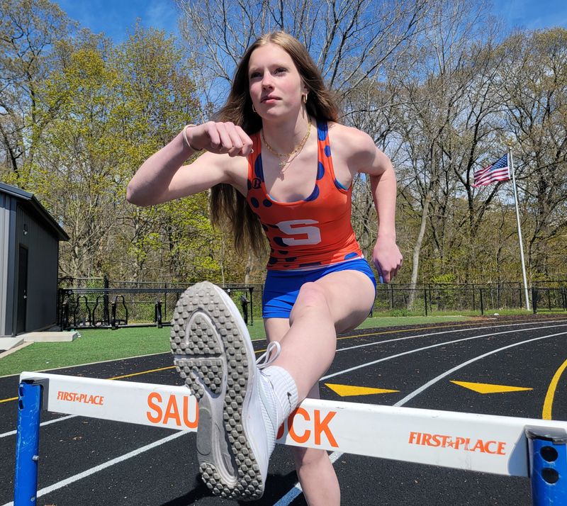 Novella DeGraaf is the Saugatuck school record holder in the 100-meter hurdles and looks to break the mark again.