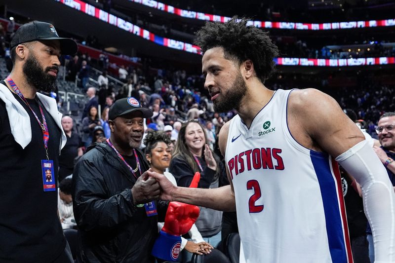 Detroit Pistons guard Cade Cunningham (2) celebrates 107-97 win over Cleveland Cavaliers with his father Keith Cunningham at Game 2 of second round of NBA playoffs at Little Caesars Arena in Detroit on Thursday, May 7, 2026.