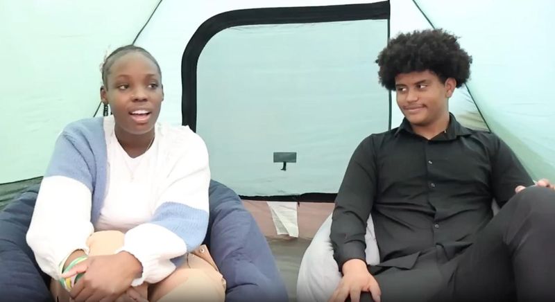 Henry Ford High School students Kierra Byrd, left, and Adriel Moravec said they Adriel were surprised at how well students adapted to their Aspen challenge project of camping out at school overnight without their phones. They talked to each other. They played games. They laughed.