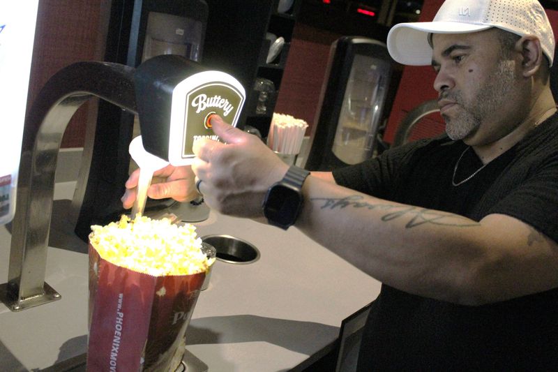 Luis Hernandez of Monroe created the "Butter Beam," a tool designed to solve the "dry popcorn" dilemma.