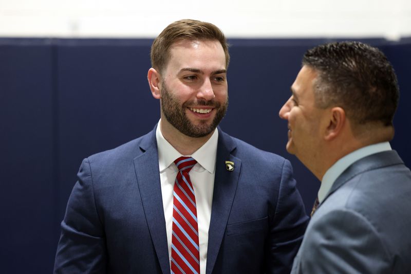Michael Bouchard, a GOP candidate for Michigan’s 10th Congressional district, meets with Martin Manna, president of the Chaldean Community Foundation, during the Breakfast of Nations 2026 event Friday at the Chaldean Community Foundation in Sterling Heights. Bouchard, the son of longtime Oakland County Sheriff Mike Bouchard, is vying for the Republican nomination this summer in the GOP-leaning suburban Detroit congressional district.