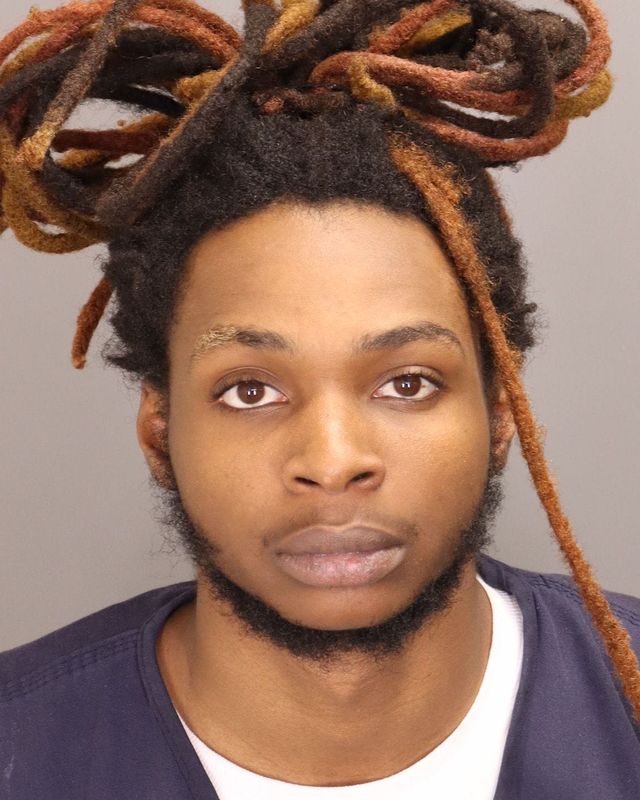 Joseph Edward Smith, 21, was charged with carrying a concealed weapon and reckless discharge of a firearm.
