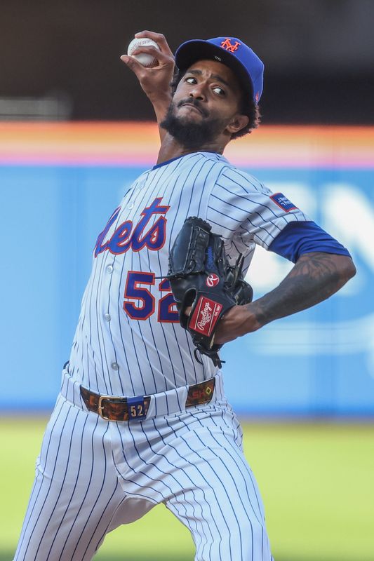 New York Mets relief pitcher Carl Edwards Jr. (52) pitches in the third inning against the Colorado Rockies at Citi Field on April 26, 2026.