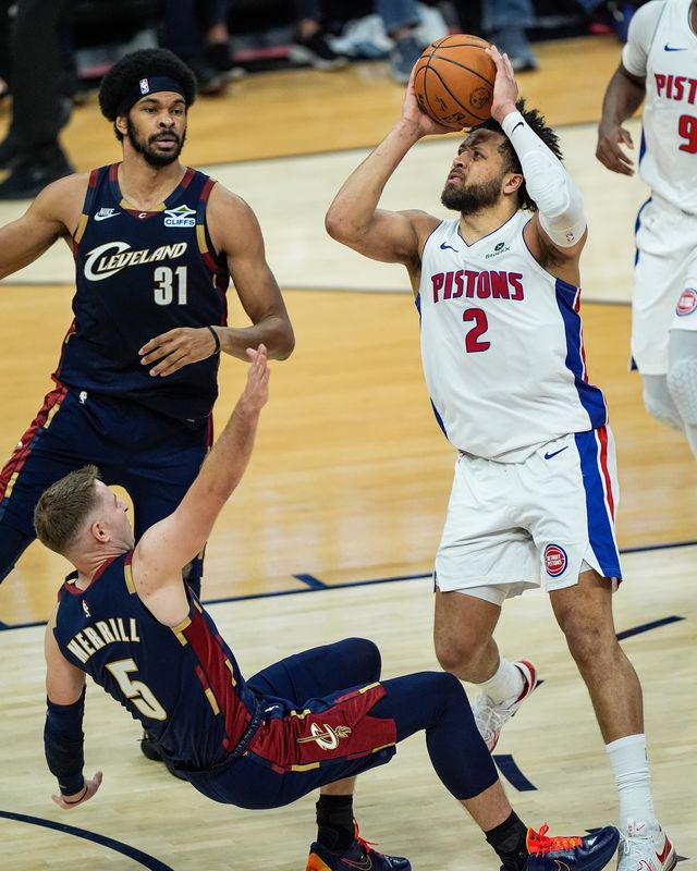 Detroit Pistons guard Cade Cunningham (2) fouls on Cleveland Cavaliers guard Sam Merrill (5) during the first half of Game 3 of second round of NBA playoffs at Rocket Arena in Cleveland on Saturday, May 9, 2026.