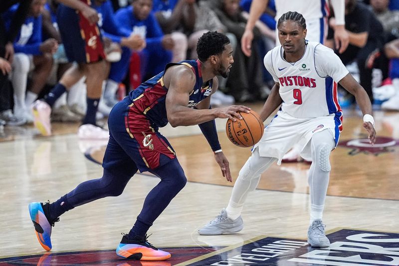 Cleveland Cavaliers guard Donovan Mitchell (45) dribbles against Detroit Pistons guard Ausar Thompson (9) during the second half of Game 3 of second round of NBA playoffs at Rocket Arena in Cleveland on Saturday, May 9, 2026.