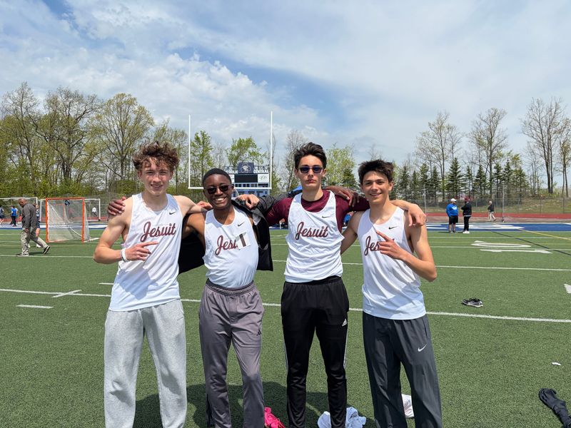 U-D Jesuit junior Justin Mkurtumian, sophomore Nick Formosa, sophomore Aaron Wilson and sophomore Eli Kujawski set a league record in the 4x800 relay on Saturday, May 9 at Novi Detroit Catholic Central High School.