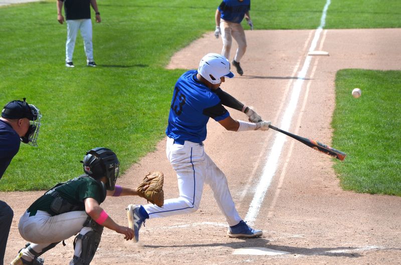 Harper Creek's Kobe Cordova takes a swing during the 2026 All-City Baseball Tournament at Bailey Park on Saturday, May 9.