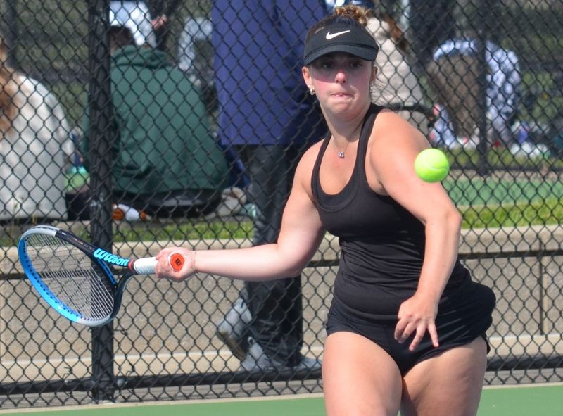 Scenes from West Ottawa's victory in the OK Red Conference tennis tournament on Saturday, May 9, at Hudsonville High School.