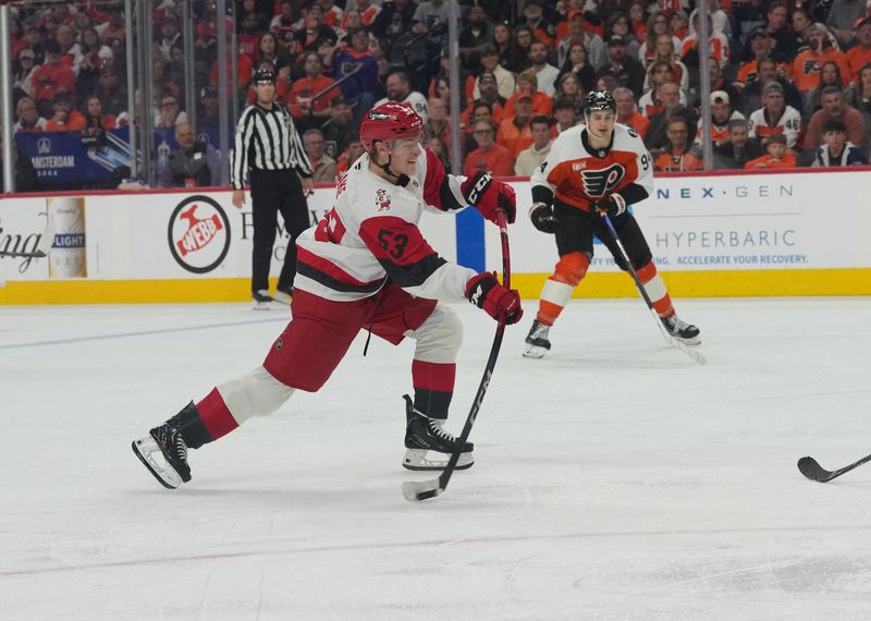 Carolina Hurricanes right wing Jackson Blake (53) shoots the winning goal in overtime against the Philadelphia Flyers in Game 4.